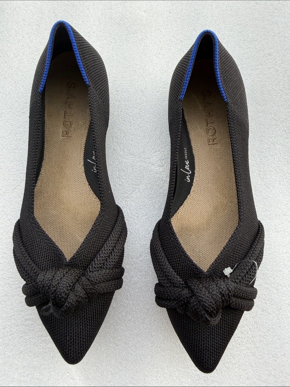 Rothy's Black Pointed Knit Flats with Knot Accent and Blue Trim